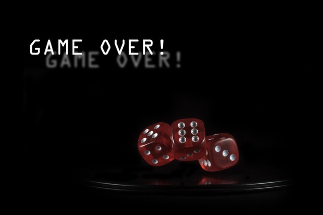 Red Dices in Dark with a Slogan 'Game Over!'